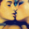 Animated sequence showing a couple kissing in color and black-and-white variations with repeated text below.