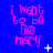 Blue background with repeated pink text "I want to be like mary" and scattered white star-like pixels in a