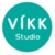 Teal circular icon with white pixelated text 'VIKK' above 'Studio' on a gray and white pixelated background.