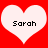 Two white heart shapes on a red background, each containing the name 'Sarah' in black pixelated text.