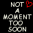 Black background with white pixelated text reading "NOT A MOMENT TOO SOON" and a red pixelated heart symbol above the word "NOT".