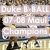 Duke basketball player in black and gold uniform holding trophy with text overlay 'Duke B-BALL 07-08 Maui Champions' on blurred crowd background.