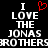 Black background with white pixelated text reading "I LOVE THE JONAS BROTHERS" and a red heart symbol replacing the 'O' in LOVE.