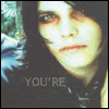 nine showing a person with dark hair and pale skin, with text changing from 'YOU'RE' to 'YOU'RE BEAUTIFUL' in white and red lettering