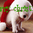 A pixelated image of a white dog wearing a red Santa hat with green text reading 'merry christ' overlaid on the top.