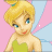 Pixelated character with blonde hair in a high ponytail, wearing green top and pink wings against pastel background.