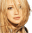 Pixelated image of a person with light brown hair next to repeated text "Hilary Duff" in multiple font styles and colors on the right side.