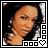 Pixelated portrait of a person with dark hair and light skin, framed by black border with white square patterns and heart symbols.