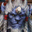 Pixelated blue and red figure with white highlights, static pose against light background.