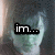 A pixelated image of a person with light hair and greenish skin, featuring text overlays that change across frames.