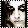 A black-and-white of four identical faces with dark eye makeup and long hair, each face framed by a dashed border