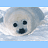 Pixelated image of a light gray seal pup with dark eyes and nose resting on white snow against a pale blue sky.