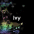 Animated icon with four distinct scenes: a dark background with 'Ivy' text, a 'Rocks!' text on a black-and-white piano, a gray striped object with colored dots, and a blank gray