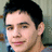 A pixelated portrait of a person with short dark hair appears on the left, next to three lines of white text reading 'david', 'archuleta', and 'is my MAN' against a black background.