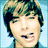 four pixelated portrait images showing a person with brown hair in three distinct facial expressions against light blue backgrounds