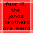 Red background with white lines and black pixelated text reading "face it. the jonas brothers are weird" in a centered layout