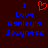 Pixelated text reads "I Love Ashley's Sexyness" with a red heart symbol replacing the word 'love' in one instance, all on dark brown background.
