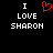 Pixelated text 'I LOVE SHARON' with a red heart symbol replacing the word 'LOVE', displayed on black background.