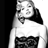 Static grayscale buddy icon of a person with long hair wearing a white top and dark patterned bottom, positioned against a black background on the left side.
