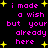 Pixelated text in pink and yellow on black background with repeated phrases and star symbols.