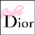 Pixelated icon featuring a large black 'D' with pink bow above it and the word 'Dior' in smaller black letters on white background.