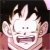 Pixelated static image of a character with spiky black hair, white face, small dark eyes, and open mouth showing teeth.