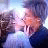 A 2x2 contact sheet of a pixelated animated icon featuring two people kissing, with text asking "Do you want to kiss me?" and the word "Footloose" at the bottom left.