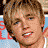 A pixelated image of a person with light brown hair in three distinct poses: upright, leaning left, and grayscale close-up.