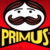 Pixelated static icon featuring a cartoon face with brown hair, white skin, and large mustache above bold yellow text reading "PRIMUS" on red background.