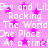 Pixelated pink background with white text repeating 'Bey and LilBey and Lil Rocking The World One Place...One Place. At a time! At a time!' surrounded by magenta stars.