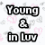 Black text on white background with pink and gray heart patterns, reading 'Young & in Luv and it sucks' in bold outlined letters.