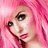 A person with bright pink hair and dark eye makeup appears in a of four , each showing slight variations in head position