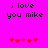 Pixelated text 'i love you mike' on bright pink background with red and pink heart symbols below.