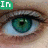 Green-eyed close-up with pixelated text overlays reading 'In', 'your', and 'eyes' on a light skin-toned background.