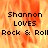 Pixelated text 'Shannon LOVES Rock & Roll' on a fiery orange-yellow background with a gray rectangle overlay.