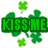 Green pixelated text and clover symbols on white background; 'KISS ME' in block letters, 'I'm Irish' with stylized font, heart-shaped clover center.