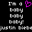 Pixelated text 'I'm a baby baby baby!' with a pink heart symbol and 'justin bieber' text on a black background.