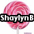 Pixelated pink lollipop with a white stick, overlaid by a black banner containing white text reading "ShaylynB".