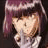Pixelated anime-style character with purple hair and white clothing, next to blue text reading "That is a secret!" on black background.
