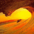 Animated sequence of a yellow-orange curved shape with a small dark spot against a brown background, showing subtle motion in the shape's outline.
