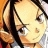 Pixelated close-up of a character's face with light skin, dark hair, and visible eye details against warm-toned background.