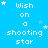 Blue background with white pixelated text 'Wish on a shooting star' repeated in pattern, scattered small stars and larger animated stars moving across the scene