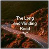 Pixelated image of a winding road with text overlay reading 'The Long and Winding Road' and two small heart symbols below the text.