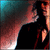 Animated sequence showing a figure in dark clothing against a gradient background shifting from teal to orange, with subtle pose changes across frames.