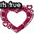 A heart-shaped frame made of pink gem-like pixels with small bubble accents, containing text overlays in black and white.