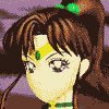 Pixelated anime-style character with brown hair tied in a high ponytail with green hair accessories, yellow forehead symbol, and green collar, shown in three sequential poses with energy effects.