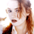Static 48x48 pixel icon showing a close-up of a person with light brown hair and fair skin, partially cropped on the right side against a white background.