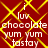 Red background with yellow crisscross lines and white text reading 'i luv chocolate yum yum tastay' in pixelated font.