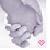 Pixelated grayscale image of a small animal with rounded ears, dark eyes, and pink nose blowing a tiny heart-shaped puff from its mouth.