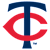 Blue T-shaped symbol with red C-shaped symbol forming a loop around it on a light gray background.